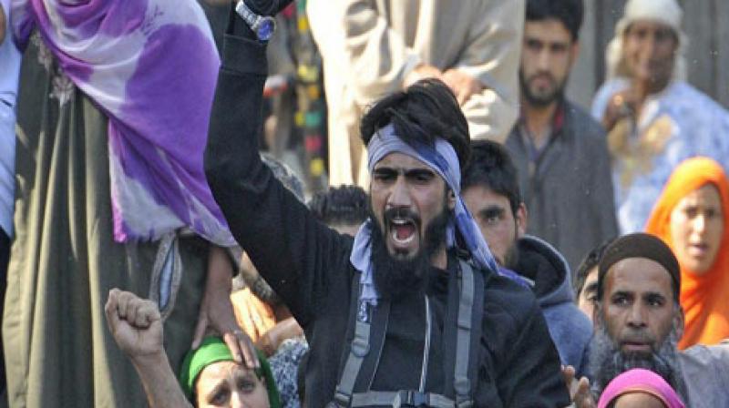 Hizbul Mujahideen militant spotted in funeral video surrenders in Jammu and Kashmir. (Photo: DC)