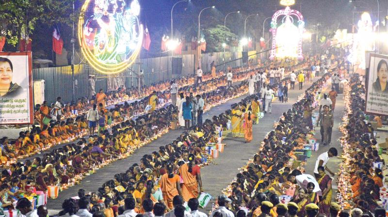 Residents of R K Nagar and AIADMK women cadres participate in a massive  vilakku poojai organised by the party north Chennai district unit on Friday (Photo: DC)