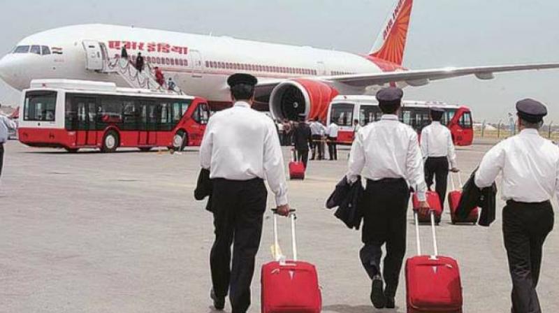 Air India pilots on their way to board a waiting plane in this undated image. (Photo: PTI)