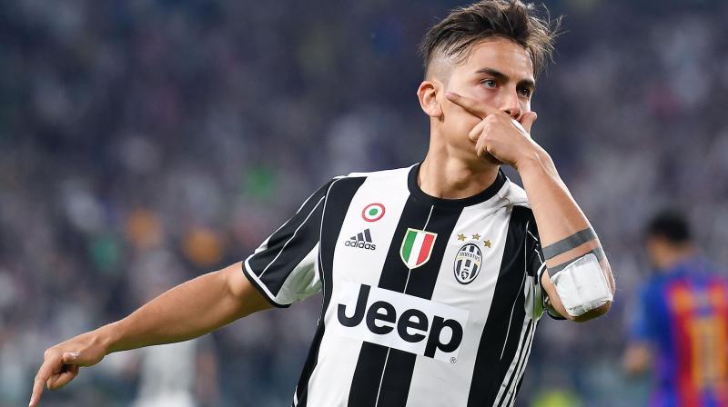 Paulo Dybala scored a delightful first-half double to eclipse his illustrious compatriot Lionel Messi. (Photo: AP)