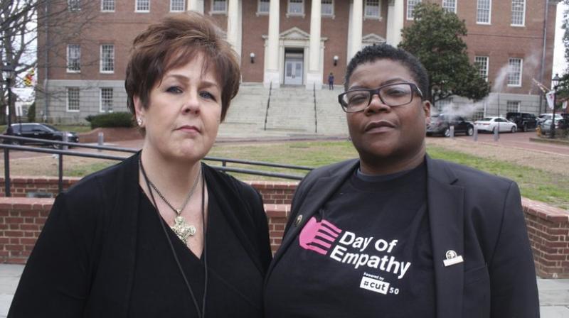 In this March 3, 2018 photo, Kimberly Haven, left, and Monica Cooper, two advocates for reforms in correctional facilities, pose for a photo in front of the Maryland State House in Annapolis, Md. (Photo: AP)