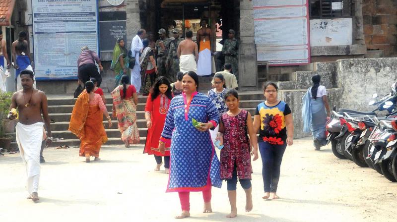 Women devotees coming out of Sree Padmanabhaswamy temple when it lifted ban on churidar recently.  (Photo: A.V. MUZAFAR)