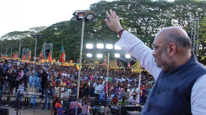 BJP president Amit Shah at the convention of party workers at Kotta Maidan in Palakkad on Friday.