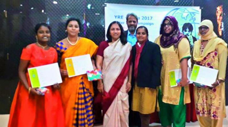 Huma Khatoon, Marina Judy and Syeda Sameena Fatima pose for a group photo with the prizes they won at nation-wide Litter Less campaign. (Photo: DC)