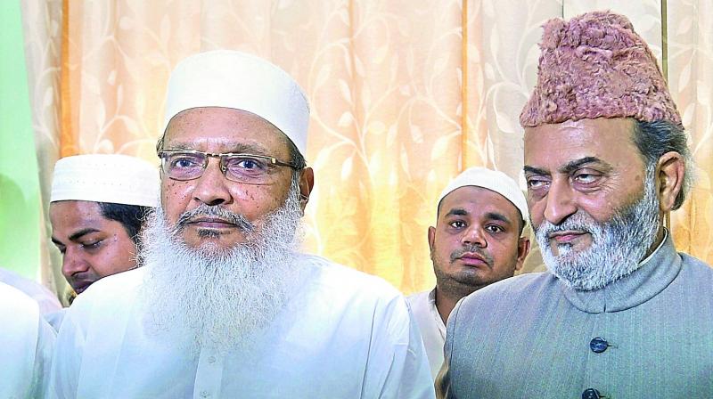 All India Muslim Personal Law Board (AIMPLB) general secretary Maulana Wali Rahmani and executive member Zafaryab Jilani at in Lucknow on Sunday. (Photo: PTI)