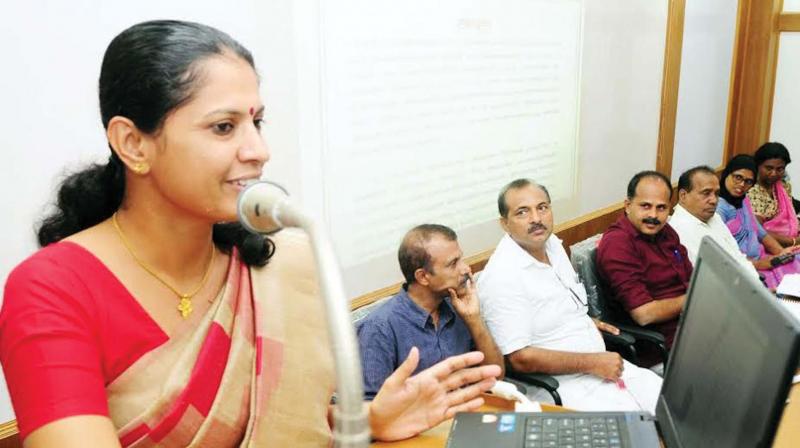 Kannur district panchayat vice-president P.P Divya presents the budget for the 2017-18 financial year on Friday. District panchayat president K.V Sumesh, Development Standing Committee Chairman V.K Suresh Babu among others look on. (Photo: DC)