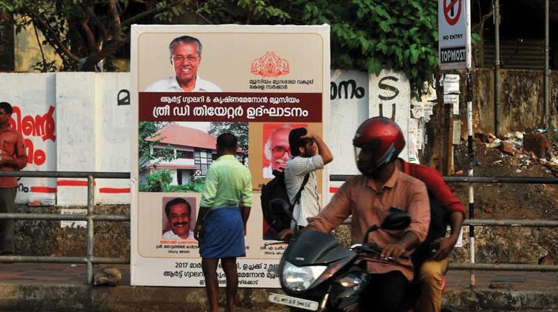 A flex board put up recently with the photo of chief minister Pinarayi Vijayan at Link Road. (Photo: DC )