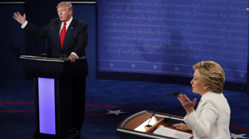 Democratic presidential nominee Hillary Clinton and Republican presidential nominee Donald Trump debate during the third presidential debate at UNLV in Las Vegas. (Photo: AP)