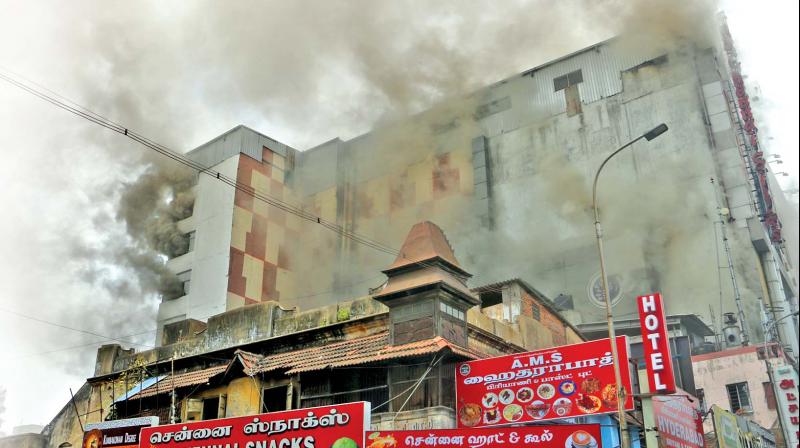 Fire which broke out at the Chennai Silks garment showroom on South Usman Road in T Nagar on Wednesday morning, refused to die down until late evening.