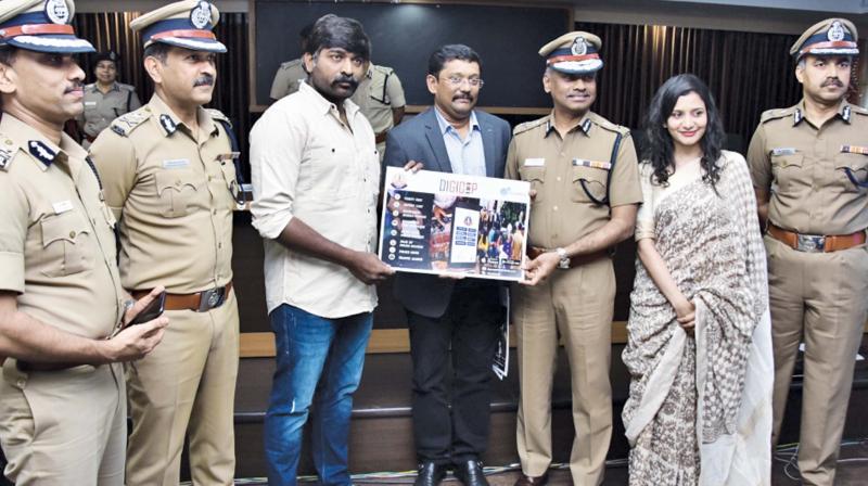 Actor Vijay Sethupathy, Commissioner A.K. Vishwanathan and others during the launch of the app on Wednesday. (Image DC)