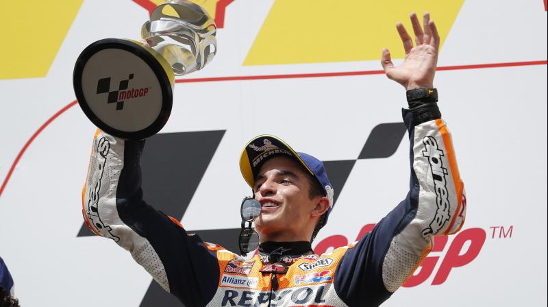 Suzukis Alex Rins came in second after overtaking Yamaha rider Johann Zarco, who finished third, in the final stage of the race at Sepang. (Photo: AP)