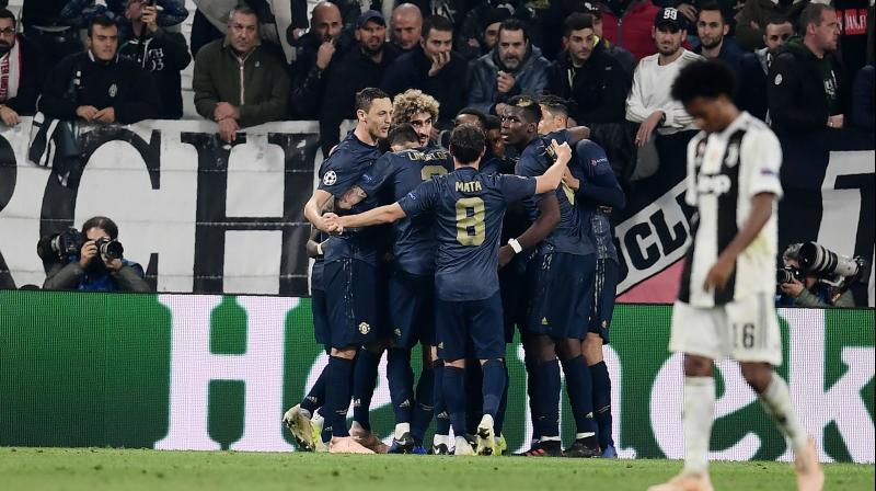 The turnaround was completed in the 90th minute when Leonardo Bonucci scored an own-goal, and United boss Jose Mourinho delighted in taking to the field at the end, cupping an ear towards the home support. (Photo: AFP)