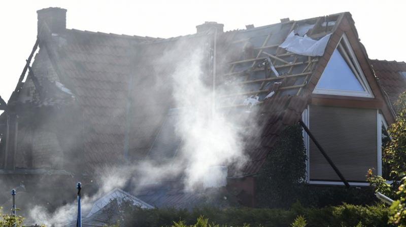 Around 70 firefighters were able to put out the blaze that followed the explosion. (Photo: AP)