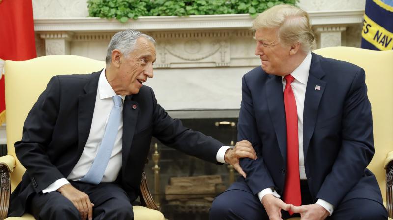 Trump greeted Rebelo de Sousa in the Oval Office and then turned to the cameras to offer his reaction to Supreme Court Justice Anthony Kennedys retirement. (Photo: AP)