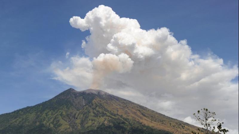 The airport was closed early Friday after a pilot flying overhead detected traces of volcanic ash as high as 23,000 feet. (Photo: AFP)
