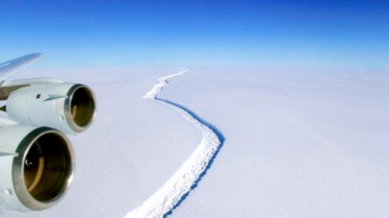A crack in the Larsen C ice shelf, a drifting extension of the land-based ice sheet, finally broke through after inching its way across the frozen formation for years. (Photo: AP)
