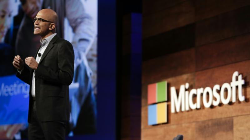 Microsoft CEO Satya Nadella, seen in 2016, is focusing the tech giant on services and Windows 10, which can integrate a variety of devices. (Photo: AFP)