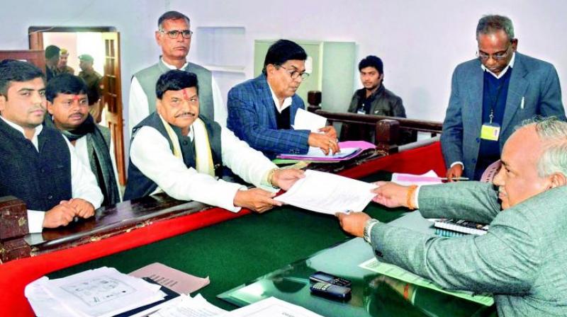 Senior leader Shivpal Singh Yadav filing his nomination papers as SP candidate in Etawah on Tuesday. (Photo: PTI)