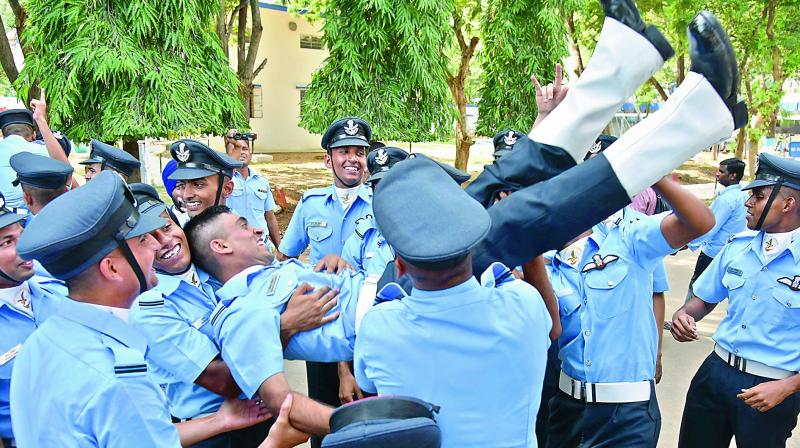 Newly graduated officers in a jubilant mood after the graduation ceremony held at Air Force Academy Dundigal, Hyderabad. 	(Image: S. Surender Reddy)