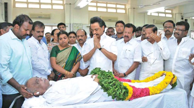 DMK working president M.K. Stalin paying respects to the partys Thoothukudi district secretary Periyasami on Friday. (Photo: DC)