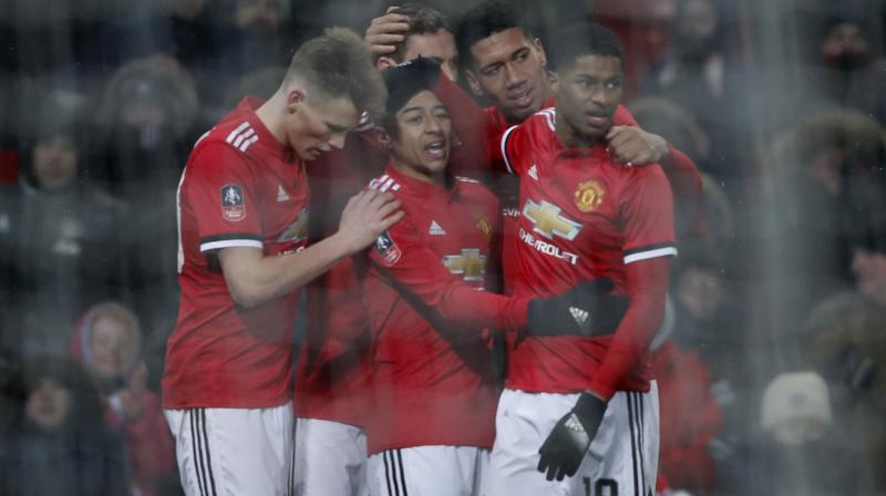 The magazine says Manchester United had nearly twice as much operating income as any other soccer team. (Photo: AP)
