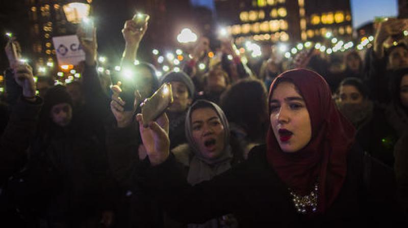 Muslim women shout slogans during a rally against President Donald Trumps order cracking down on immigrants living in the US at Washington Square Park in New York. (Photo: AP)