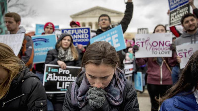 Anti-abortion activists converge in front of the Supreme Court in Washington during the annual March for Life. (Photo: AP)