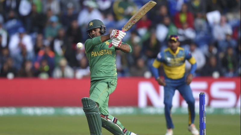 Pakistans Sarfraz Ahmed hits out during the ICC Champions Trophy, Group B cricket match between Pakistan and Sri Lanka, at the Cardiff Stadium. (Photo: PTI)