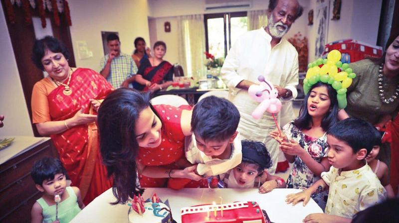 Rajini was seen enjoying himself at the birthday bash of his grandson Ved, son of his younger daughter Soundarya recently at Poes Garden. Rajini was seen enjoying himself at the birthday bash of his grandson Ved, son of his younger daughter Soundarya recently at Poes Garden.
