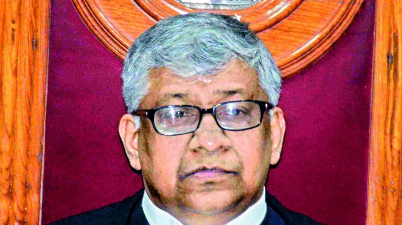 Justice Thottathil B. Radhakrishnan.