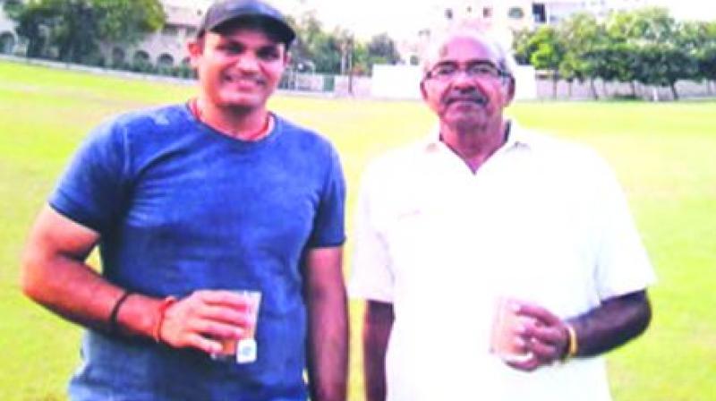 Sehwags and his coach A.N. Sharma
