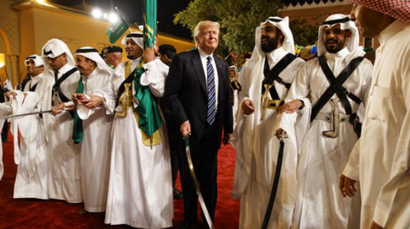 Video: Trump sways along with Saudi officials at traditional sword ceremony