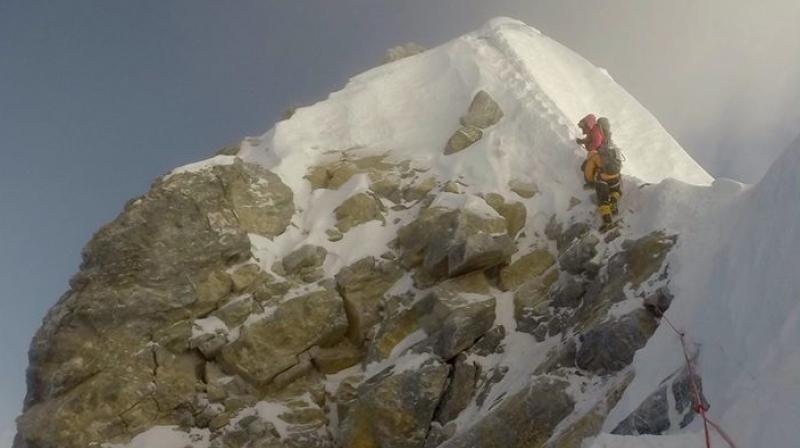 The near-vertical 12-metre rocky outcrop stood on the mountains south-east ridge and was the last great challenge before the top. (Photo: Tim Mosedale/Twitter)