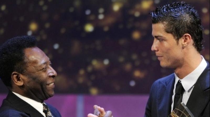 Brazillian football legend Pele and Portugals Cristiano Ronaldo. (Photo: AFP)