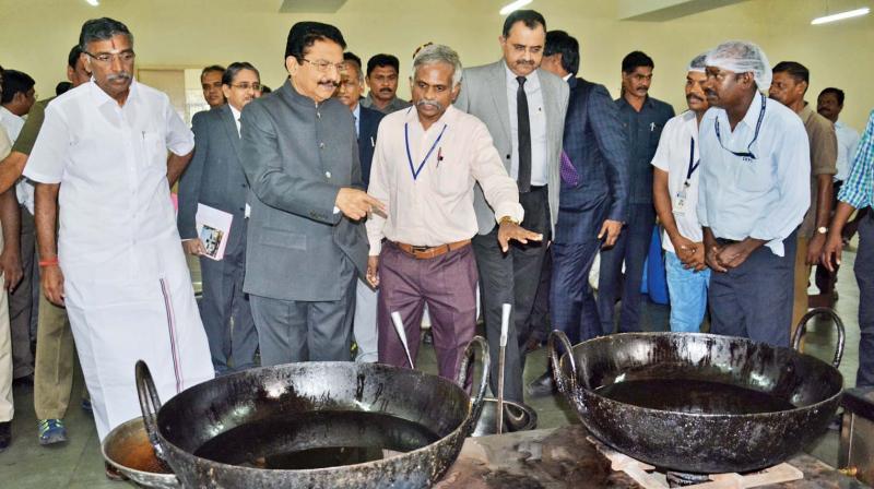 Governor Ch. Vidayasagar Rao along with the higher education minister K.P. Anbalagan inspects the womens hostel kitchen in Anna University. (Photo: DC)