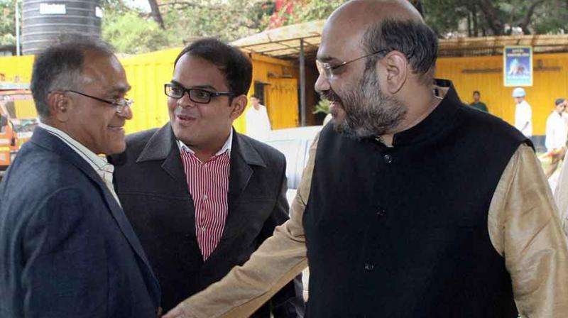 The BJP leader further said that the article is written to damage the reputation of party president Amit Shah. In picture: Amit Shah (right) and his son Jay Shah (centre). (Photo: ANI)
