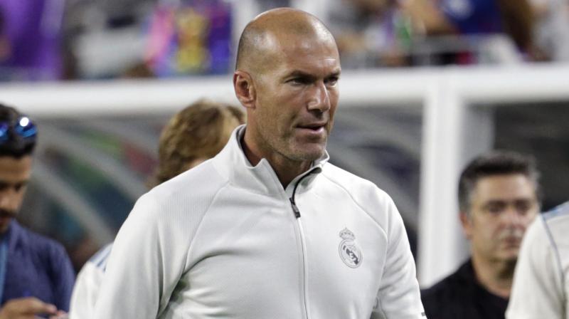 Zinedine Zidane insisted he is not desperate to add to his forward line before the transfer window closes on August 31, despite selling strikers Alvaro Morata and Mariano Diaz this summer.(Photo: AP)