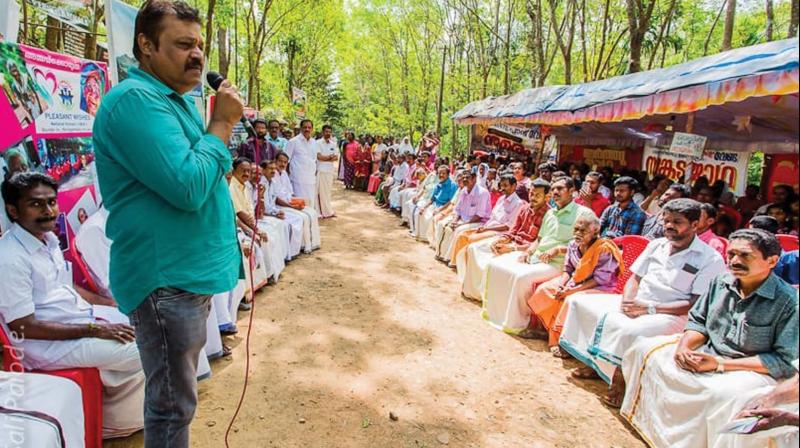 Suresh Gopi, MP, addresses the action council members and the residents of Peringamala during his visit on Friday.