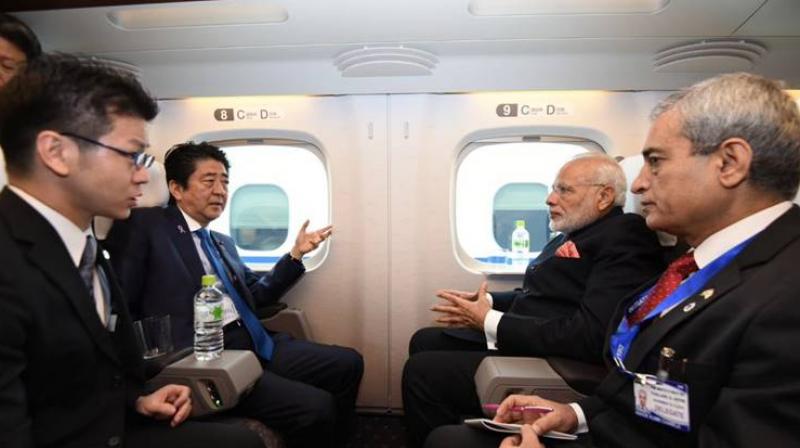 â€œOn the way to Kobe with PM @AbeShinzo. We are on board the Shinkansen bullet train,â€ the Prime Minister tweeted. (Photo: Twitter)