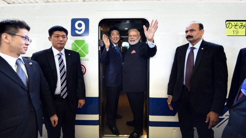 After India, Japan ink nuclear deal, Modi and Abe ride on famed bullet train
