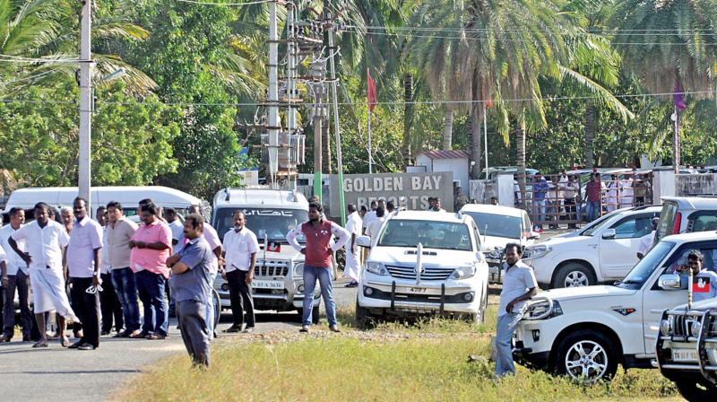 Vehicles of MLAs parked outside the Golden Bay resort in Koovathur on Monday (Photo: DC)