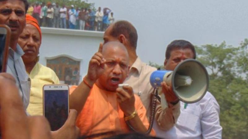 Uttar Pradesh Chief Minister Yogi Adityanath reached the accident spot after visiting the district hospital to meet the victims and their families. (Photo: PTI)