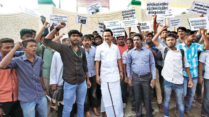 DMK working president M.K. Stalin leads the protest at  New College on Thursday. (Photo: DC)