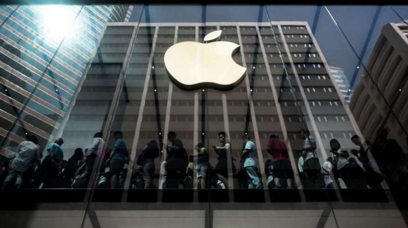 In Australia, hundreds of people usually gather at Apples Sydney city store, with queues winding down George Street in the central business district. But there were fewer than 30 people lining up before the store opened on Friday, according to a Reuters witness. (Photo: AFP)