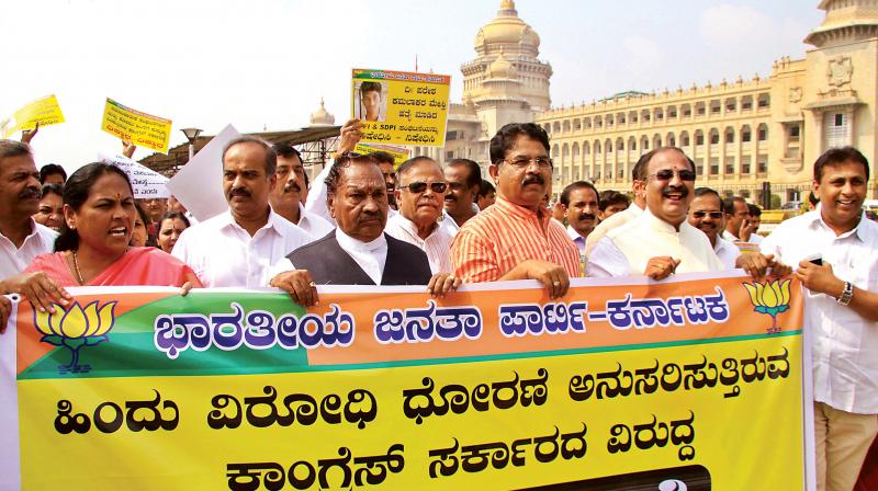 BJP leaders headed by R. Ashok took out a procession from Vidhana Soudha to Raj Bhavan and submitted a memorandum to the Governor.
