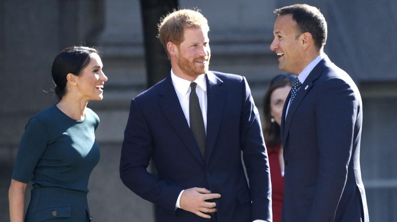 Britains Prince Harry and Meghan Duchess of Sussex arrive to meet with the Irish Prime Minister Leo Varadkar, right, at government buildings in Dublin, Ireland, Tuesday, July 10, 2018. (Photo: AP)