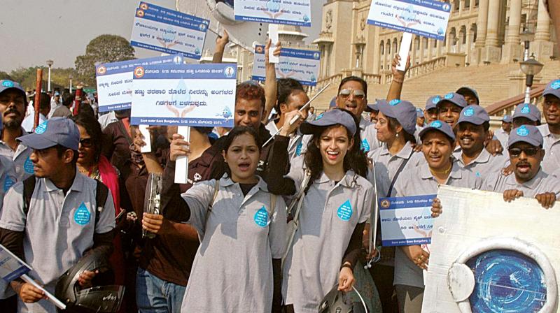 Volunteers participate in a campaign Save Water Save Bengaluru on World Water Day, at Vidhana Soudha, in Bengaluru on Wednesday	 (Photo: DC)