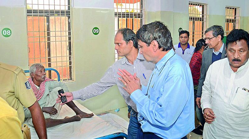 Railway minister Suresh Prabhu consoles the Hirakhand Express train mishap victims during his visit to the Rayagada District Headquarters Government Hospital on Sunday. AP home minister N. Chinnarajappa is also seen (Photo: DC)