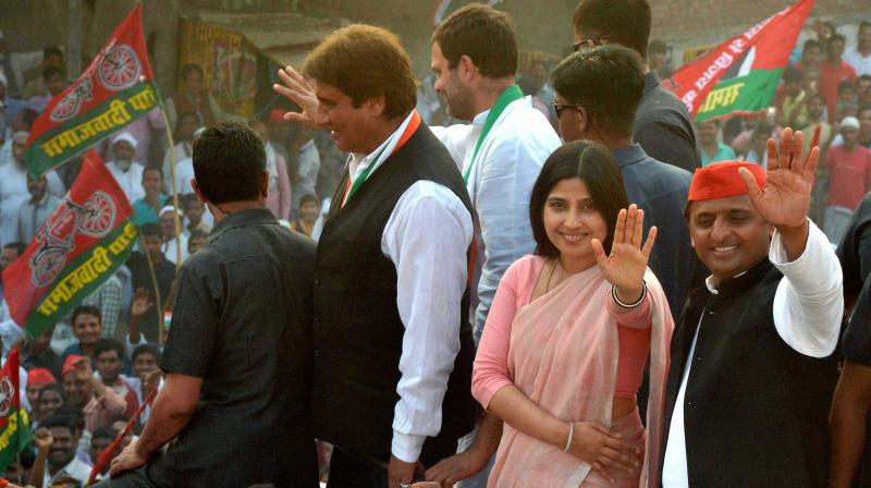 Congress Vice President Rahul Gandhi, UP Chief Minister Akhilesh Yadav and his wife Dimple Yadav. (Photo: PTI)