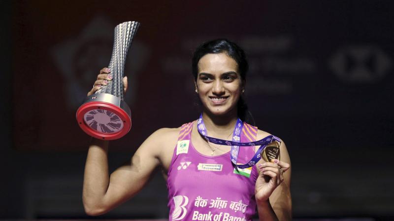 Sindhu, after winning the World Tour Finals championship, became the first Indian ever to get hold of the prestigious championship. (Photo: AP)